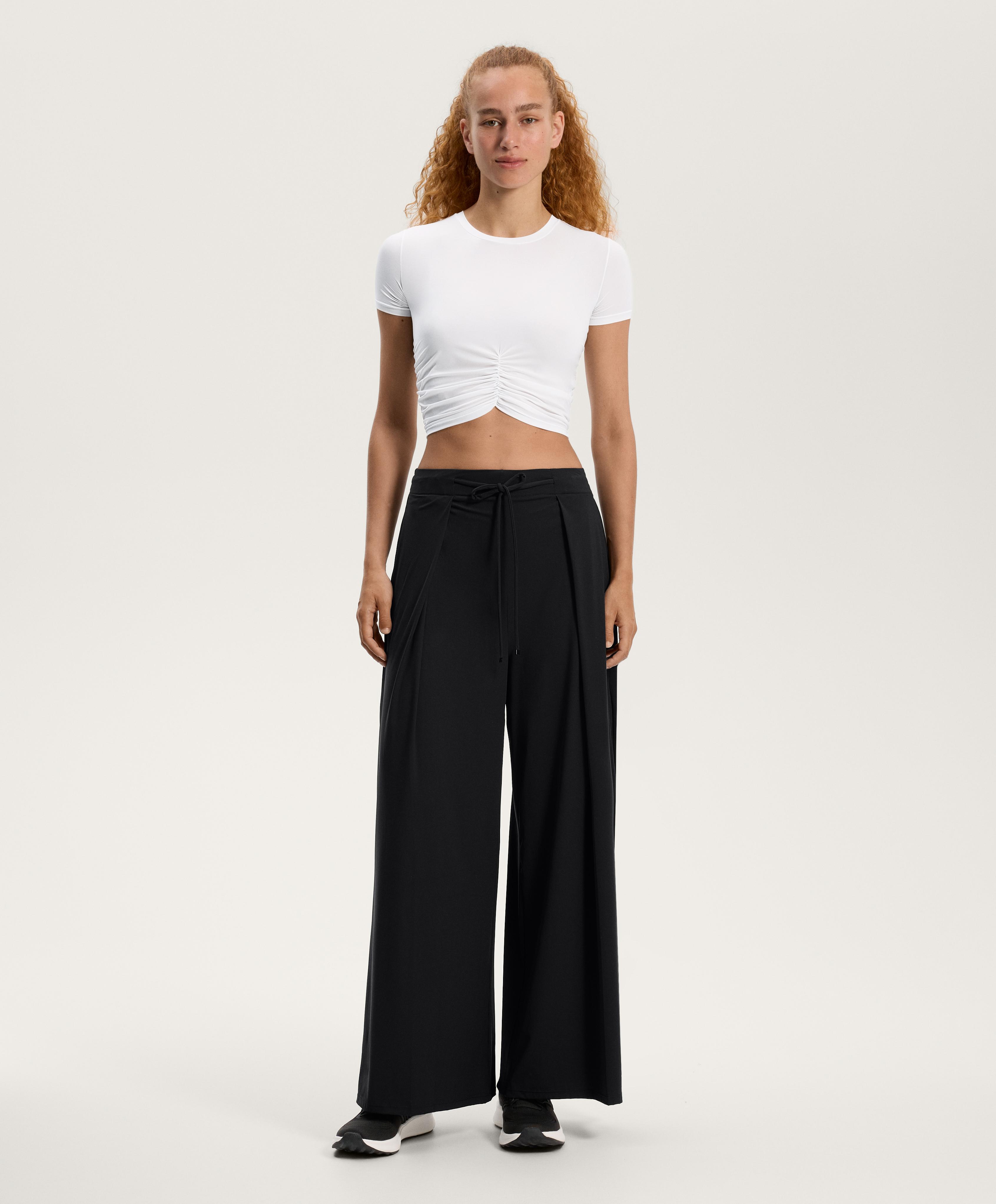 Light Touch wide-leg pleated trousers