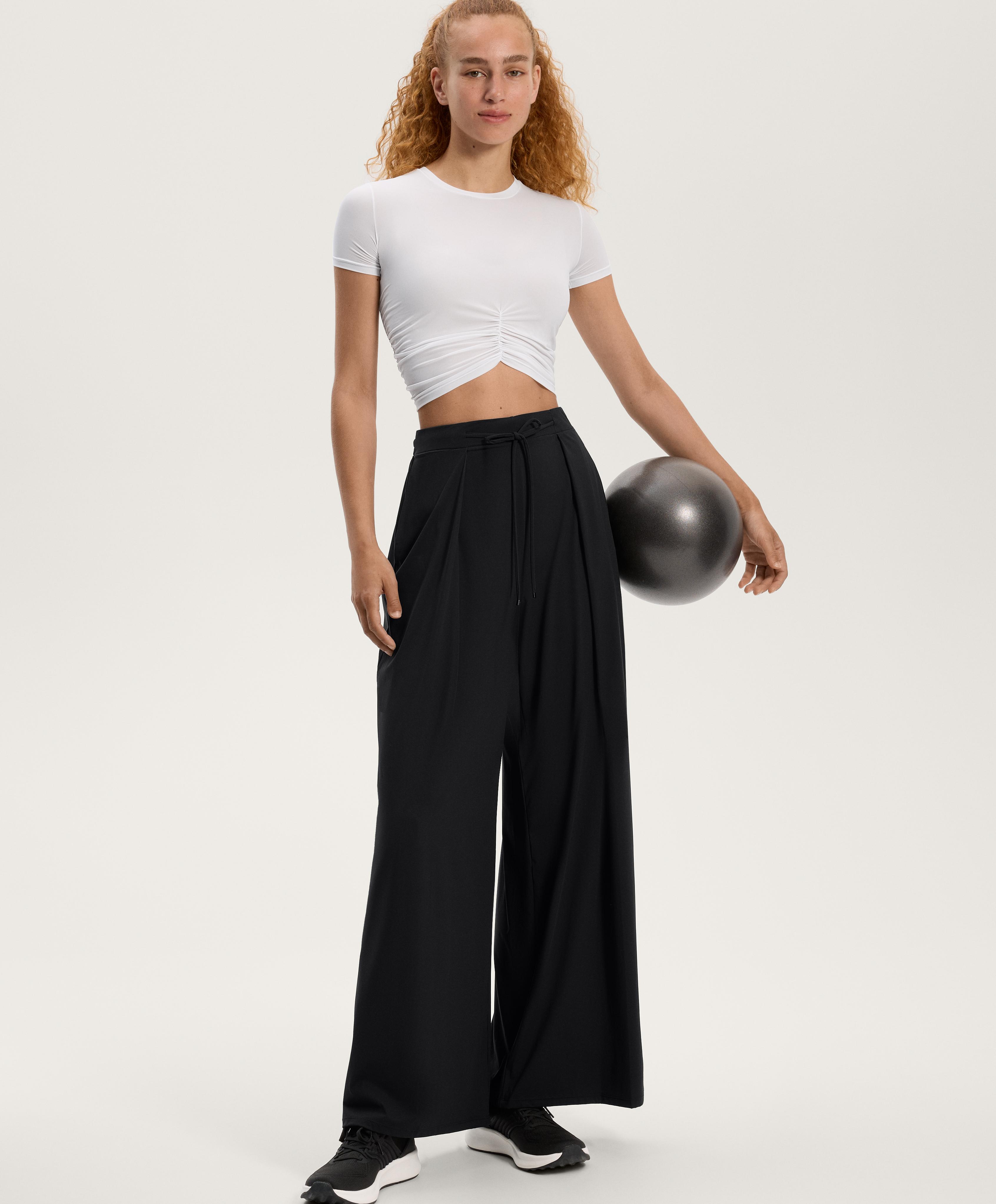 Light Touch wide-leg pleated trousers