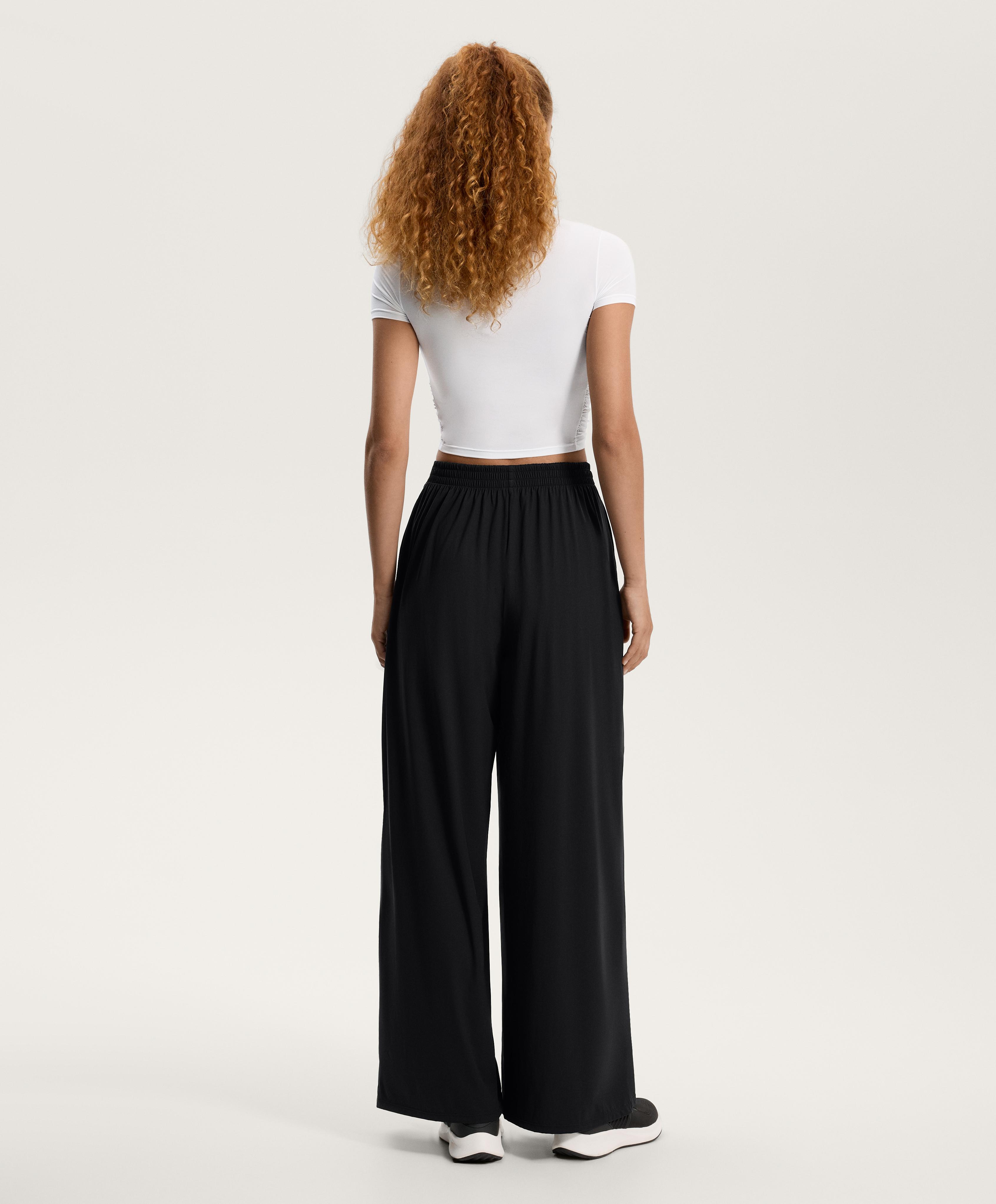 Light Touch wide-leg pleated trousers