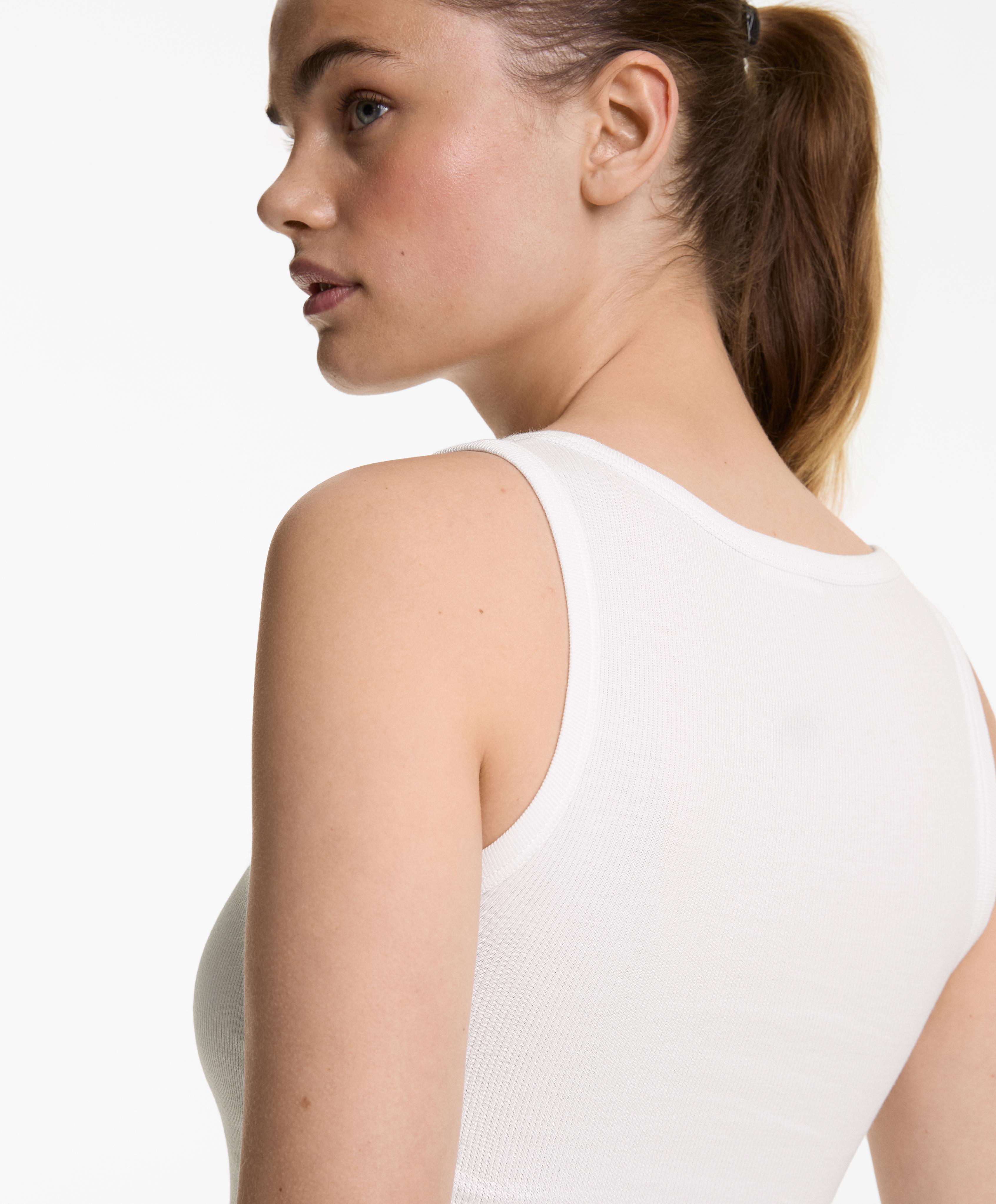 Sleeveless buttoned top with cotton and modal