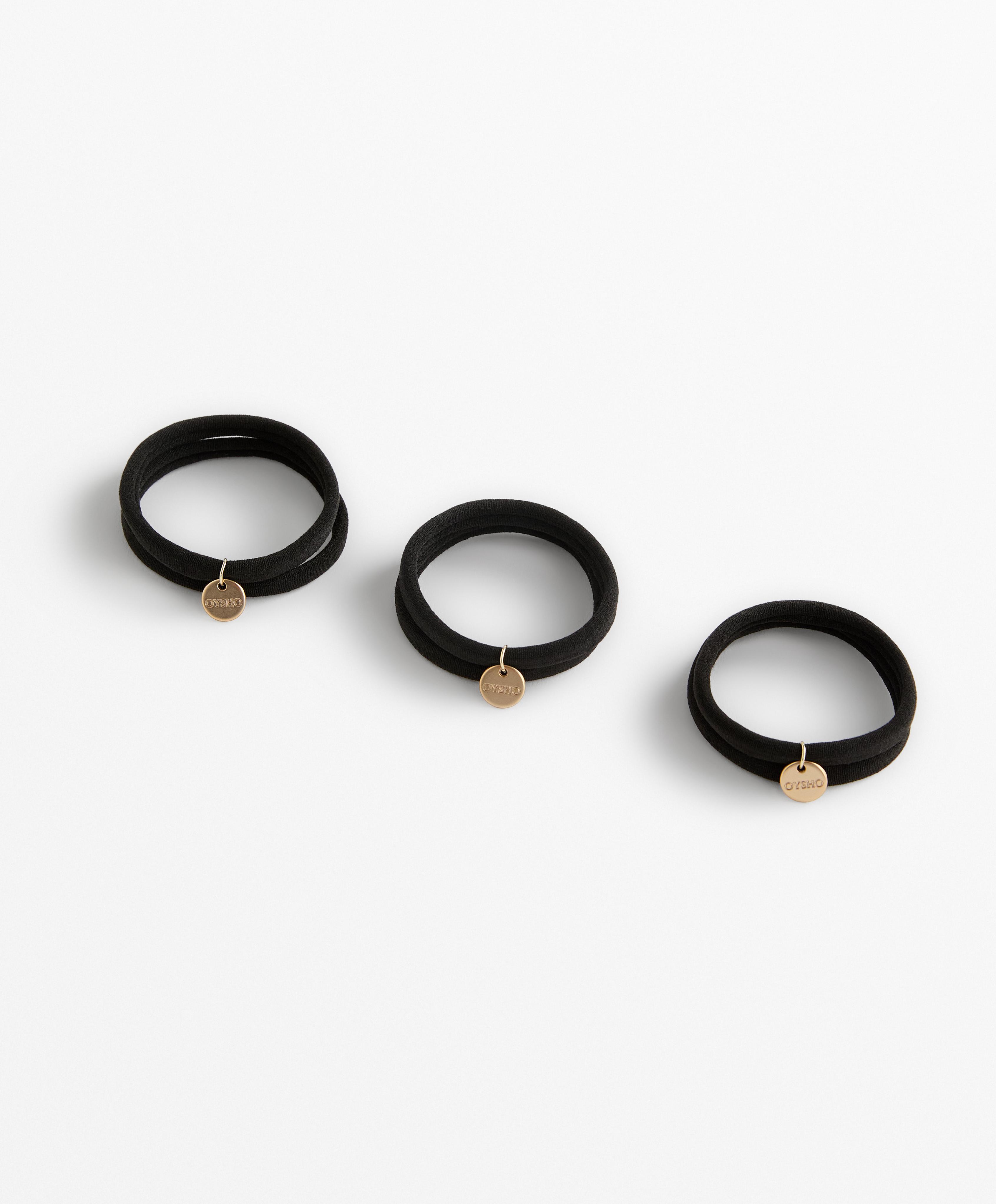 6 hair ties with Oysho plaque